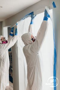 disaster restoration technicians sectioning off rooms