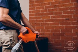 water damage restoration technician in office